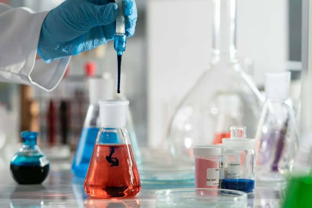 Close-Up Shot of a Person Holding a Flask